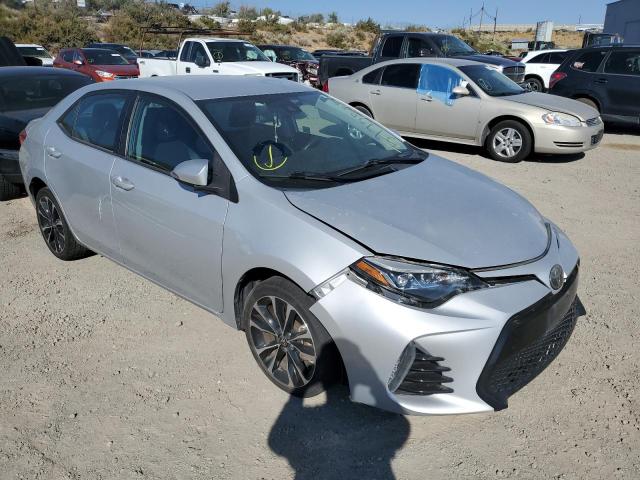 TOYOTA COROLLA L 2017 with VIN 2T1BURHE2HC749787 - Photo from auction