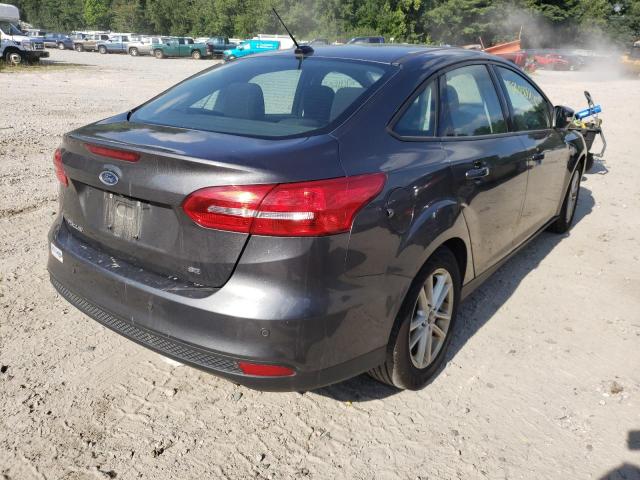 Photo 4 from auction – 2015 FORD FOCUS SE with VIN 1FADP3F23FL310549