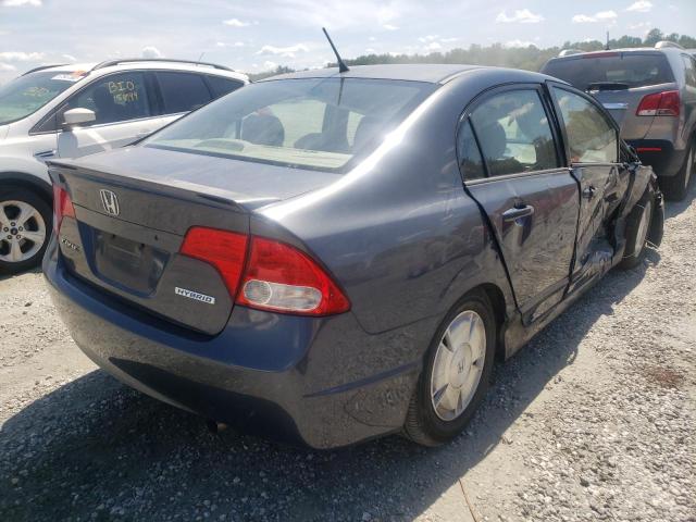 Photo 4 from auction – 2006 HONDA CIVIC HYBR with VIN JHMFA36236S024693