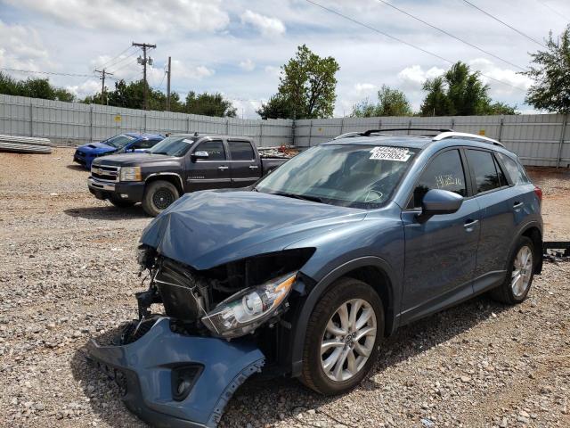 Photo 2 from auction – 2015 MAZDA CX-5 GT with VIN JM3KE2DY1F0458135