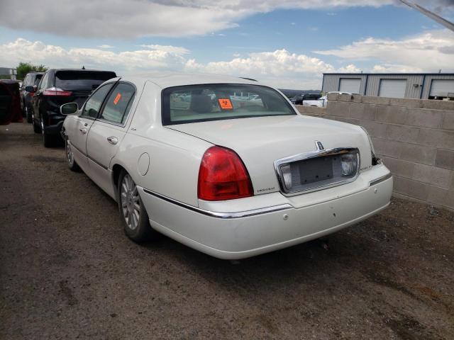 Photo 3 from auction – 2004 LINCOLN TOWN CAR U with VIN 1LNHM83W24Y637044