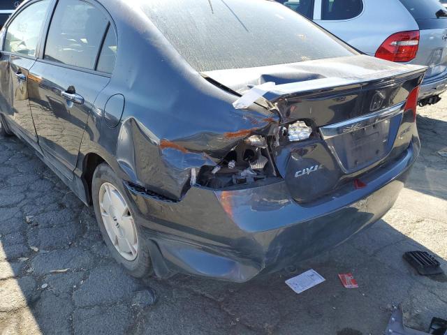 Photo 9 from auction – 2010 HONDA CIVIC HYBR with VIN JHMFA3F21AS006833