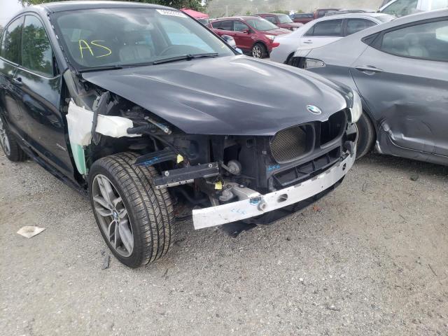 BMW X4 XDRIVE2 2015 with VIN 5UXXW3C57F0M86576 - Photo from auction