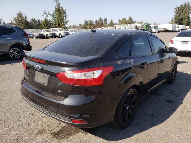 Photo 4 from auction – 2014 FORD FOCUS with VIN 1FADP3F23EL350869