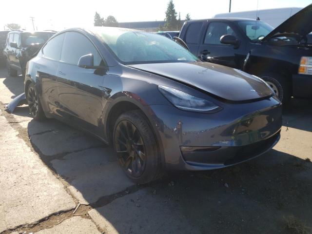 TESLA MODEL Y 2022 with VIN 7SAYGDEE6NF358662 - Photo from auction