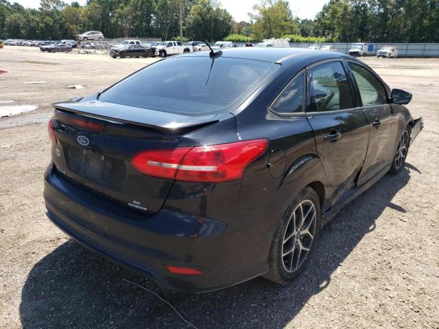 Photo 4 from auction – 2016 FORD FOCUS SE with VIN 1FADP3F26GL241681