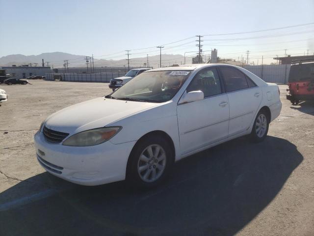 Photo 2 from auction – 2002 TOYOTA CAMRY LE with VIN 4T1BF30K12U020016