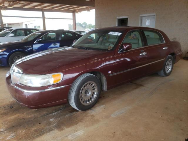 Photo 2 from auction – 2001 LINCOLN TOWN CAR C with VIN 1LNHM83W11Y710156
