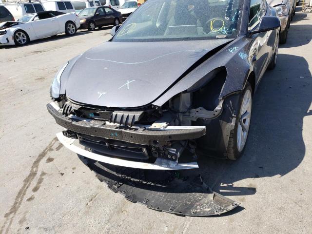 Photo 9 from auction – 2022 TESLA MODEL 3 with VIN 5YJ3E1EA1NF143487