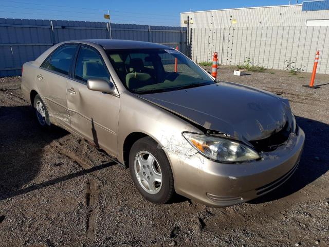 TOYOTA CAMRY LE 2003 with VIN 4T1BF32K53U565974 - Photo from auction