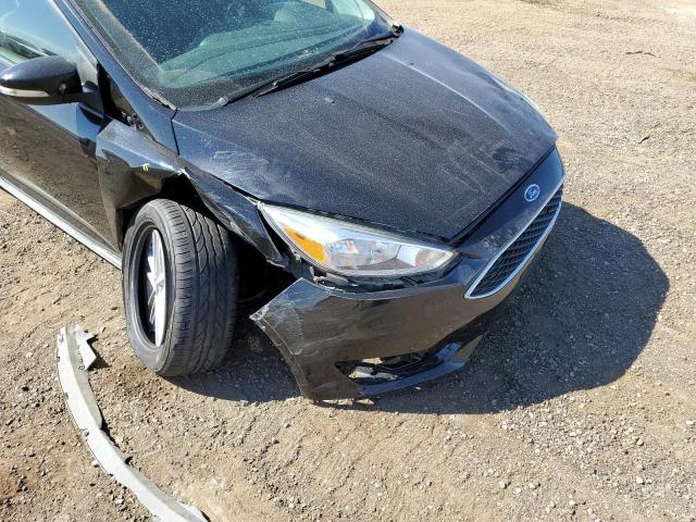 Photo 9 from auction – 2017 FORD FOCUS SE with VIN 1FADP3F21HL234221