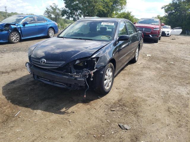 Photo 2 from auction – 2002 TOYOTA CAMRY LE with VIN JTDBE30K220042623