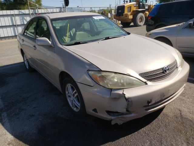 TOYOTA CAMRY LE 2003 with VIN JTDBE32K130168082 - Photo from auction