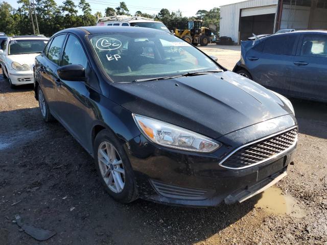 FORD FOCUS SE 2018 with VIN 1FADP3F24JL329586 - Photo from auction