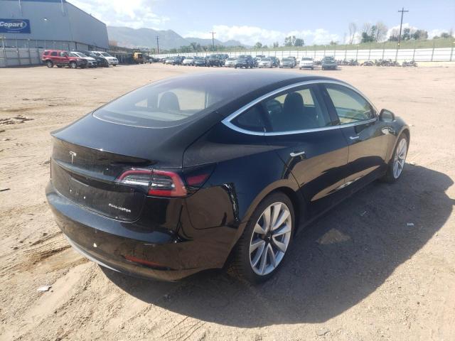 Photo 4 from auction – 2018 TESLA MODEL 3 with VIN 5YJ3E1EB2JF086705