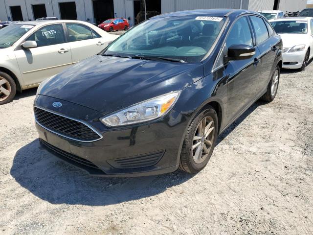 Photo 2 from auction – 2017 FORD FOCUS SE with VIN 1FADP3F22HL321951