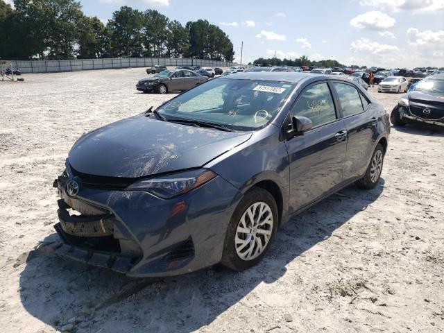 Photo 2 from auction – 2017 TOYOTA COROLLA L with VIN 5YFBURHE5HP684806