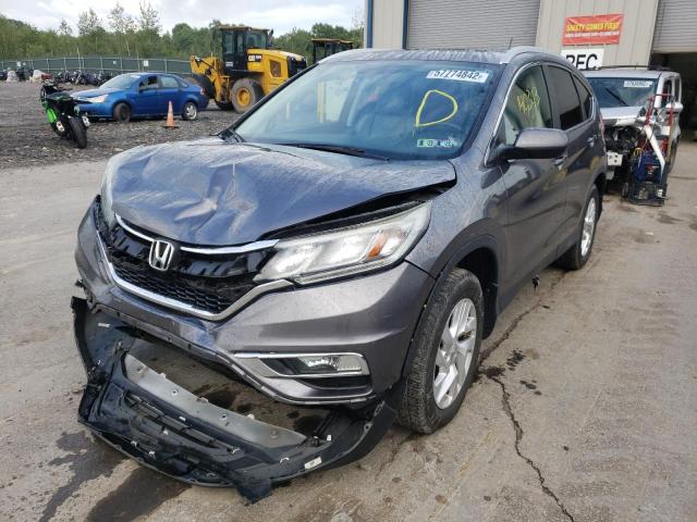 Photo 2 from auction – 2015 HONDA CR-V EXL with VIN 2HKRM4H71FH634093