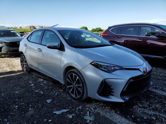 TOYOTA COROLLA L 2018 with VIN 5YFBURHE3JP793383 - Photo from auction