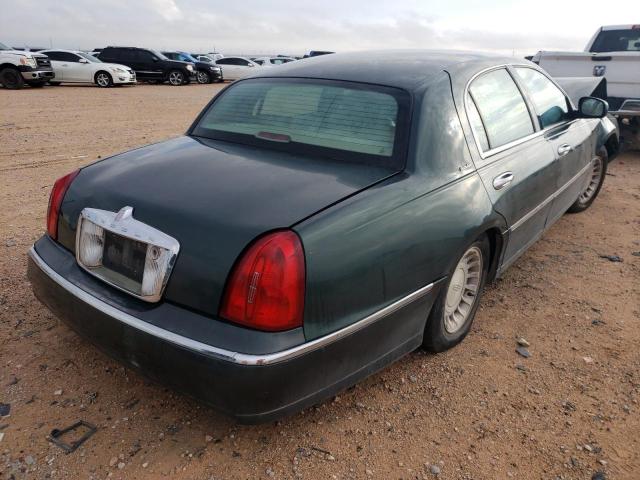 Photo 4 from auction – 2001 LINCOLN TOWN CAR E with VIN 1LNHM81W11Y738428