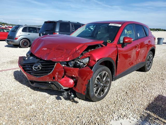 Photo 2 from auction – 2016 MAZDA CX-5 GT with VIN JM3KE2DY4G0780334
