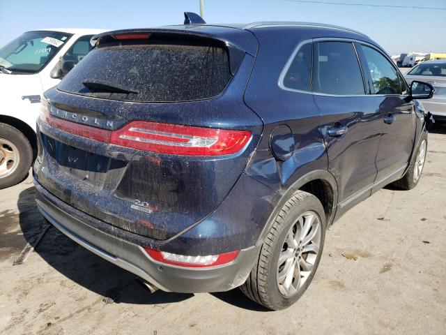 Photo 4 from auction – 2015 LINCOLN MKC with VIN 5LMCJ1A90FUJ32098