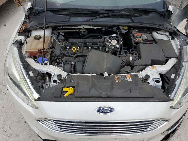Photo 7 from auction – 2016 FORD FOCUS TITA with VIN 1FADP3J28GL380217