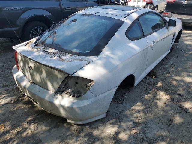 Photo 4 from auction – 2003 HYUNDAI TIBURON with VIN KMHHM65D63U065661