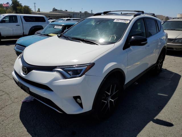 Photo 2 from auction – 2018 TOYOTA RAV4 SE with VIN JTMNFREV7JJ728178