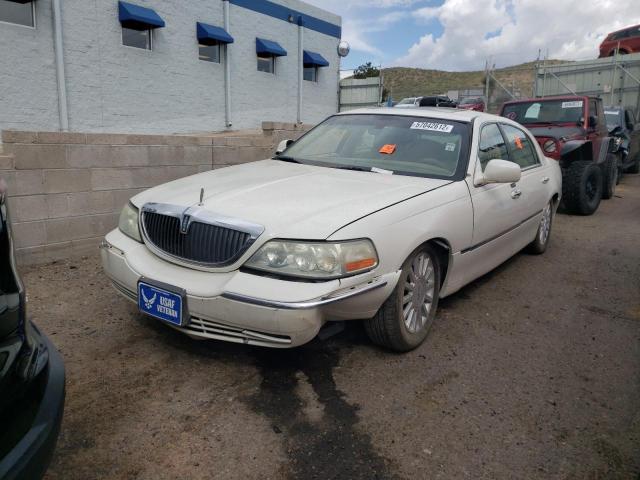Photo 2 from auction – 2004 LINCOLN TOWN CAR U with VIN 1LNHM83W24Y637044