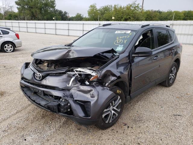 Photo 2 from auction – 2016 TOYOTA RAV4 LE with VIN JTMZFREV0GJ095596