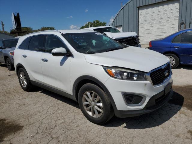 KIA SORENTO LX 2016 with VIN 5XYPG4A54GG067717 - Photo from auction