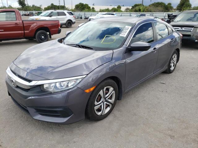 Photo 2 from auction – 2017 HONDA CIVIC LX with VIN 19XFC2F55HE051092