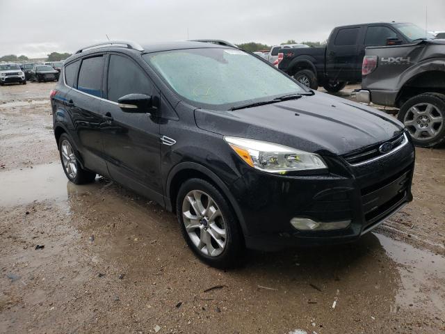 FORD ESCAPE TIT 2016 with VIN 1FMCU0JX2GUB36366 - Photo from auction