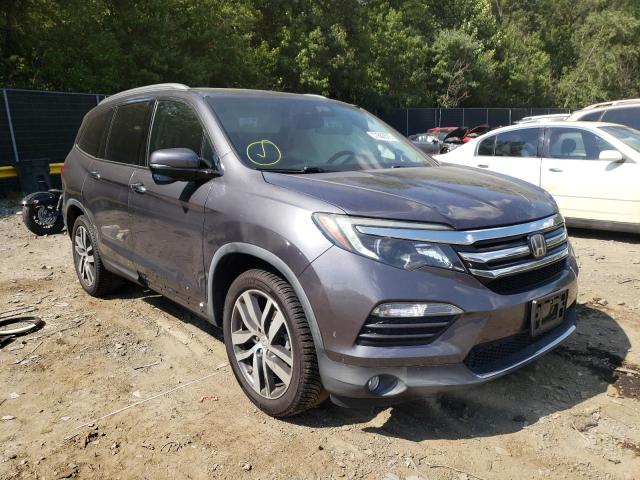 HONDA PILOT TOUR 2016 with VIN 5FNYF5H94GB029238 - Photo from auction