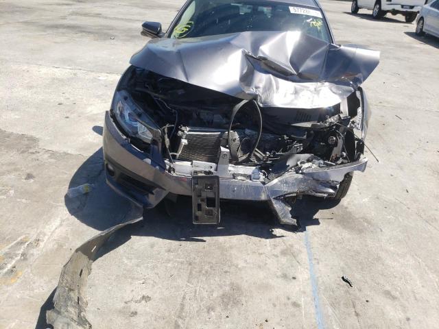 Photo 9 from auction – 2018 HONDA CIVIC EX with VIN JHMFC1F35JX037545