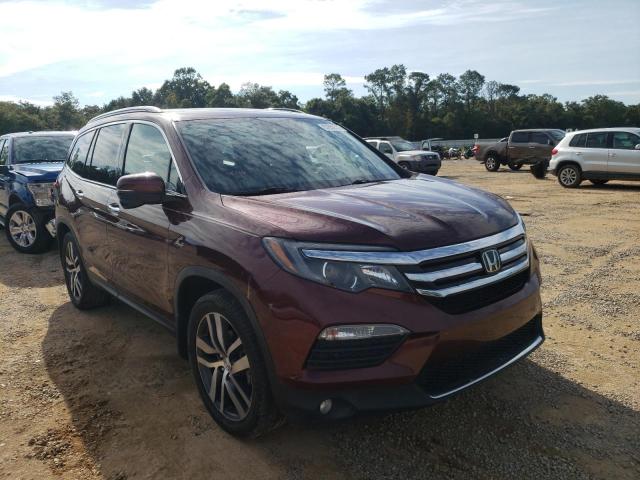 HONDA PILOT TOUR 2018 with VIN 5FNYF5H94JB003908 - Photo from auction