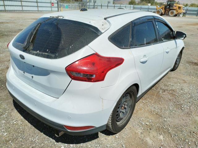 Foto 4 de la subasta – 2015 FORD FOCUS SE con VIN 1FADP3KE6FL232607