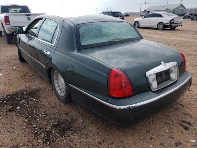 Photo 3 from auction – 2001 LINCOLN TOWN CAR E with VIN 1LNHM81W11Y738428
