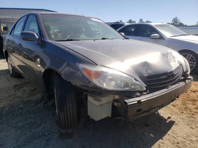TOYOTA CAMRY LE 2002 with VIN 4T1BE32K82U561922 - Photo from auction