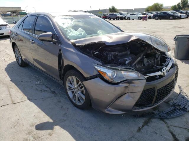 TOYOTA CAMRY LE 2017 with VIN 4T1BF1FKXHU345526 - Photo from auction