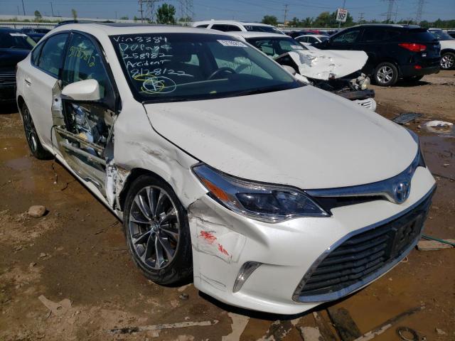 TOYOTA AVALON HYB 2016 with VIN 4T1BD1EB5GU053384 - Photo from auction