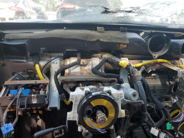 Photo 8 from auction – 2003 HYUNDAI TIBURON with VIN KMHHM65D63U065661