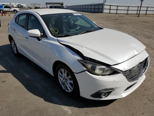 MAZDA 3 TOURING 2014 with VIN JM1BM1L7XE1133328 - Photo from auction
