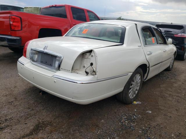 Photo 4 from auction – 2004 LINCOLN TOWN CAR U with VIN 1LNHM83W24Y637044