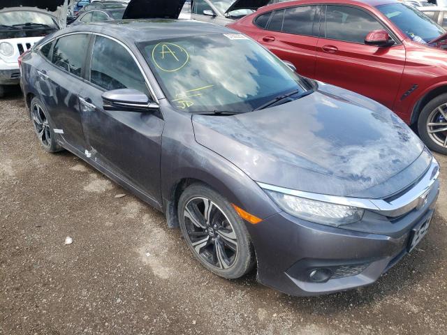 HONDA CIVIC TOUR 2016 with VIN 2HGFC1F95GH109932 - Photo from auction