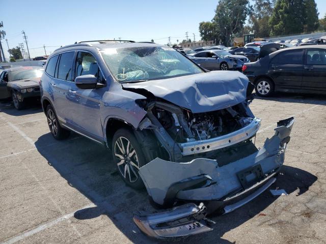 HONDA PILOT TOUR 2022 with VIN 5FNYF5H66NB019250 - Photo from auction