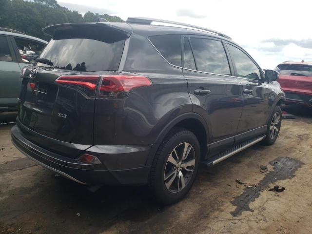 Photo 4 from auction – 2017 TOYOTA RAV4 XLE with VIN JTMWFREV7HJ118988