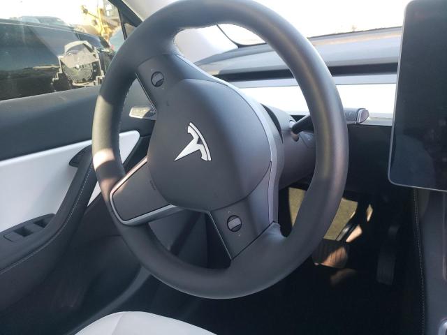 Photo 9 from auction – 2022 TESLA MODEL Y with VIN 7SAYGDEE6NF358662