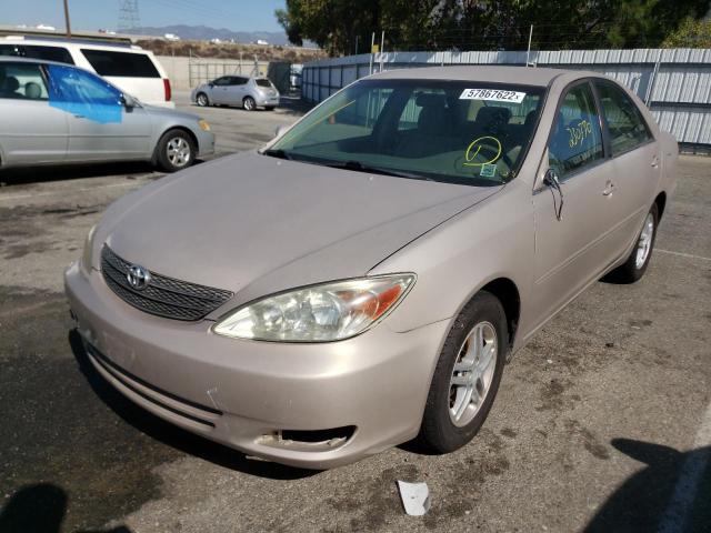 Photo 2 from auction – 2003 TOYOTA CAMRY LE with VIN JTDBE32K130168082